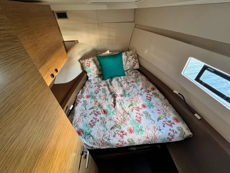 Slide: The Image of Cozy cabin interior of 2017 Fountaine Pajot MY 37 with floral bedding. - 29