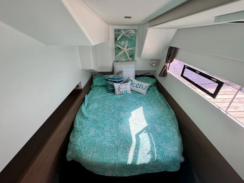 Slide: The Image of Cozy bedroom in 2017 Fountaine Pajot MY 37 yacht with ocean-themed decor. - 26
