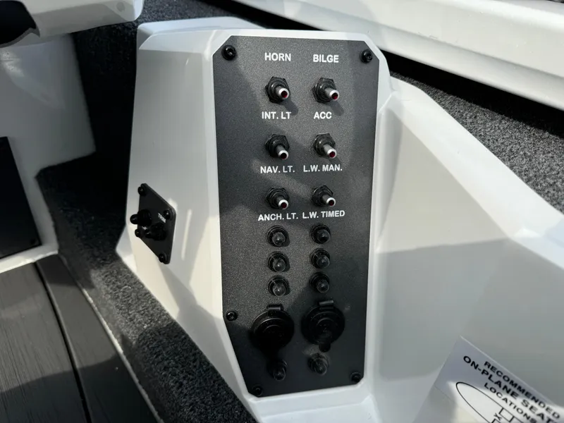 Slide: The Image of Control panel of 2025 Vexus AVX1980 boat with switches for horn, bilge, and lights. - 10