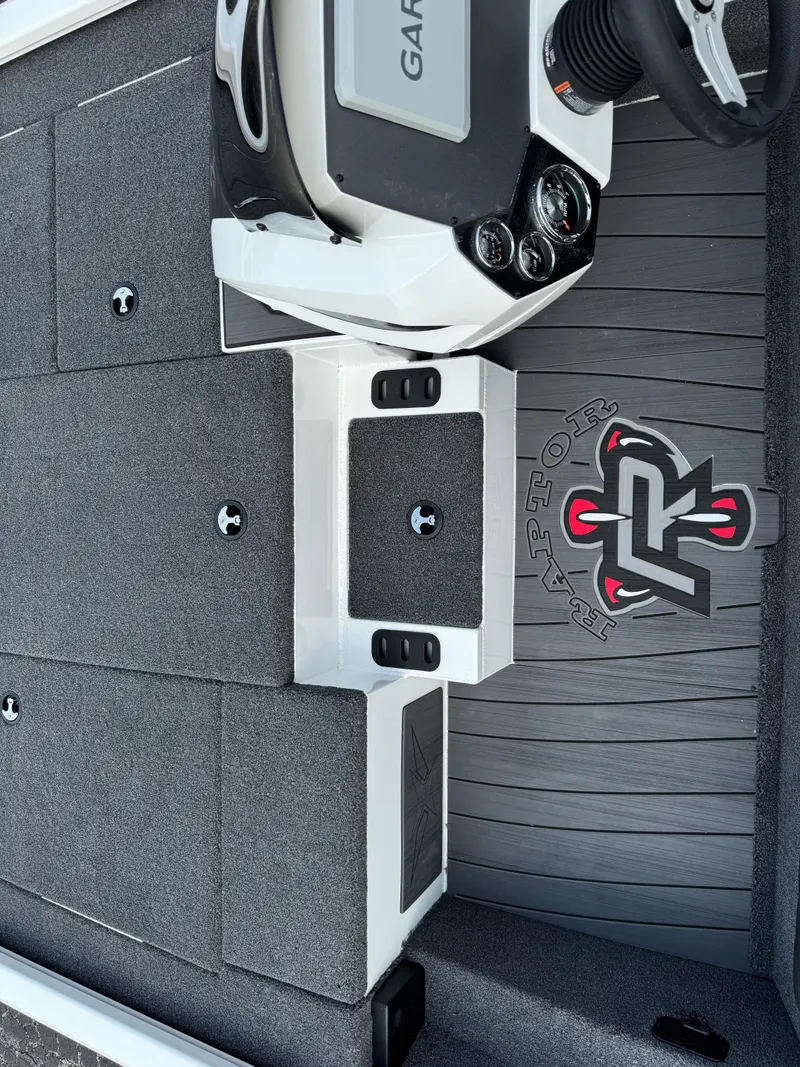 Slide: The Image of 2025 Vexus AVX1980 boat interior with Garmin console and textured flooring. - 16