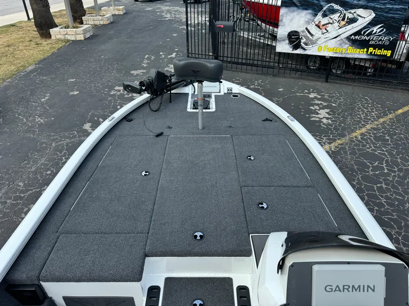 Slide: The Image of 2025 Vexus AVX1980 boat deck with Garmin equipment, displayed outdoors. - 19