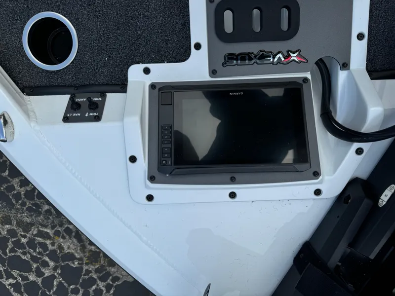 Slide: The Image of 2025 Vexus AVX1980 boat dashboard with electronic display and controls. - 26