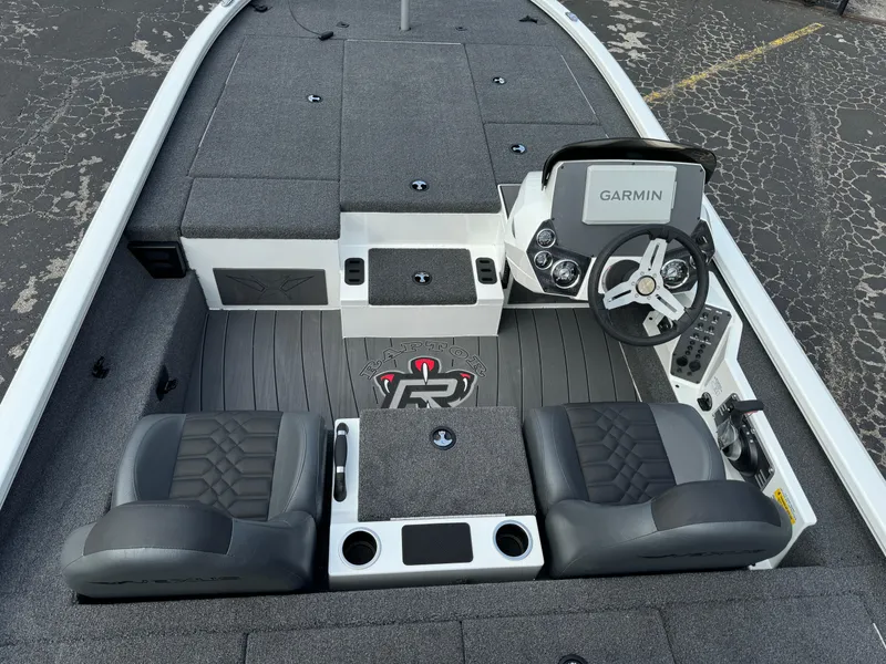 Slide: The Image of 2025 Vexus AVX1980 boat interior with Garmin system and dual seats. - 6