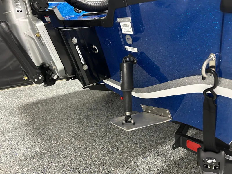Slide: The Image of 2025 Nitro ZV20 boat trailer hitch and support detail in a showroom setting. - 11