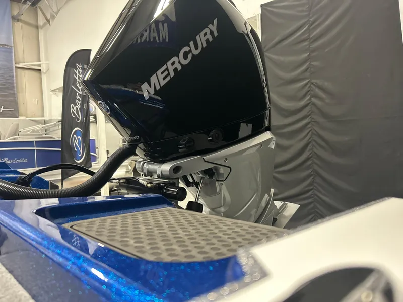 Slide: The Image of 2025 Nitro ZV20 boat with Mercury engine, showcasing sleek design and modern features. - 14