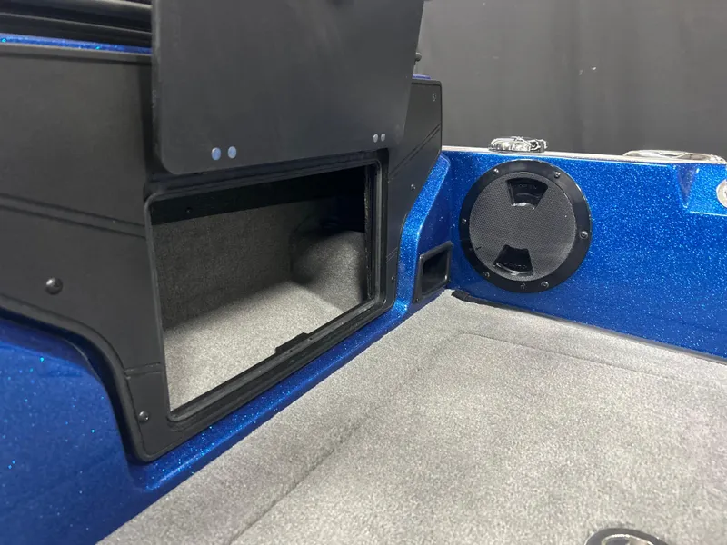Slide: The Image of Interior of 2025 Nitro ZV20 boat with speaker and storage compartment. - 24