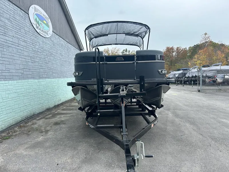 Slide: The Image of 2025 Avalon 2385 Catalina VRB pontoon boat on trailer at dealership. - 5