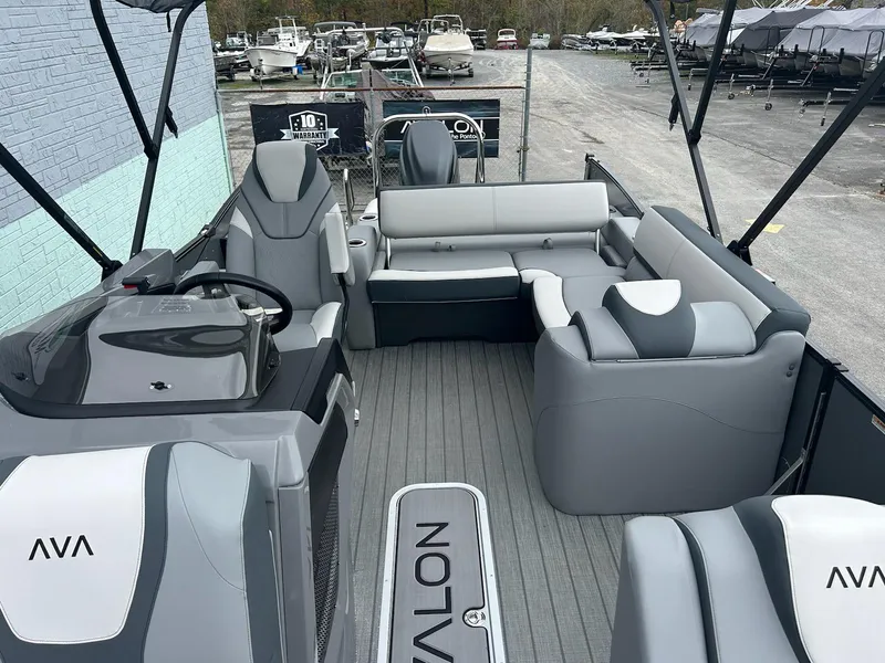 Slide: The Image of 2025 Avalon 2385 Catalina VRB pontoon boat with sleek gray interior and spacious seating. - 8