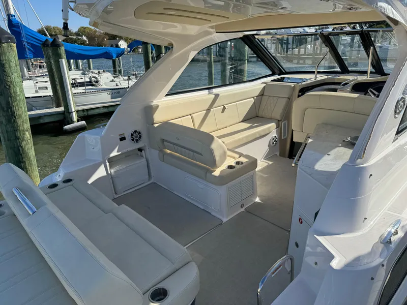 Slide: The Image of 2020 Regal 35 Sport Coupe interior with beige seating and modern design. - 28