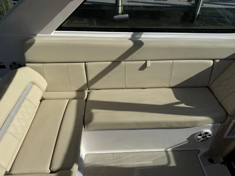 Slide: The Image of 2020 Regal 35 Sport Coupe interior seating with beige upholstery and modern design. - 33