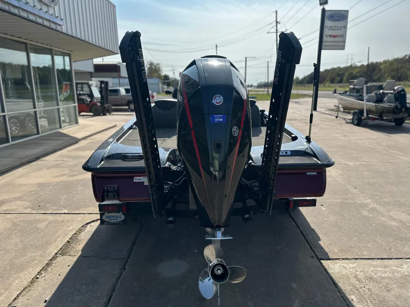 Slide: The Image of 2022 Caymas CX19 boat rear view with motor and power poles. - 3