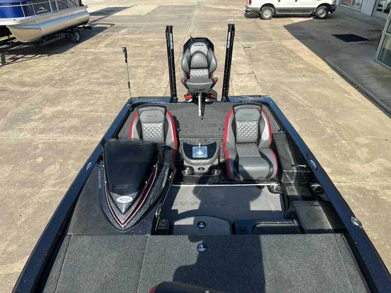 Slide: The Image of 2022 Caymas CX19 boat interior with three seats and control panel. - 7