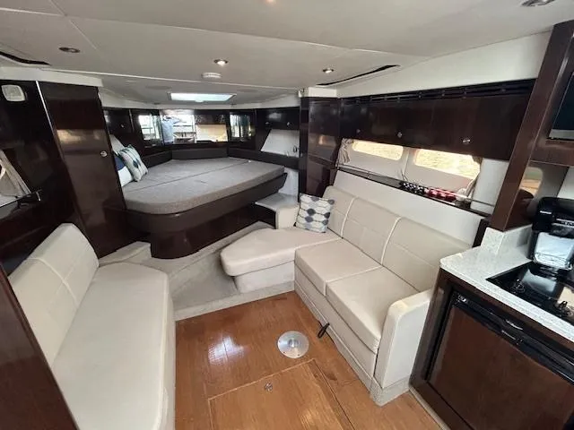 Slide: The Image of Luxurious interior of 2016 Sea Ray 350 Sundancer yacht with modern furnishings. - 20