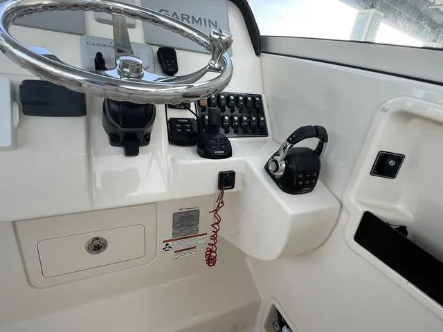 Slide: The Image of Control panel of 2019 Grady-White Freedom 325 boat with Garmin navigation system. - 20
