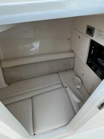 Slide: The Image of 2019 Grady-White Freedom 325 boat interior with sink and toilet. - 31