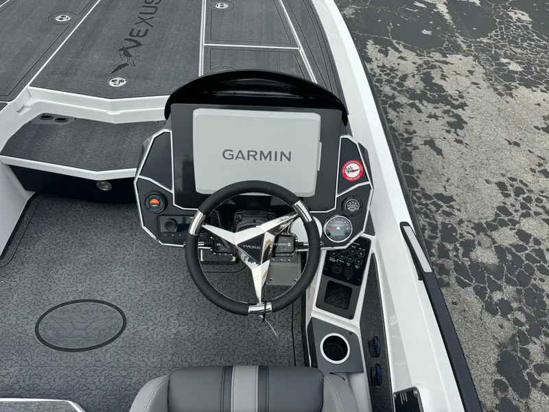 Slide: The Image of 2025 Vexus VXS21 boat dashboard with Garmin navigation system. - 11