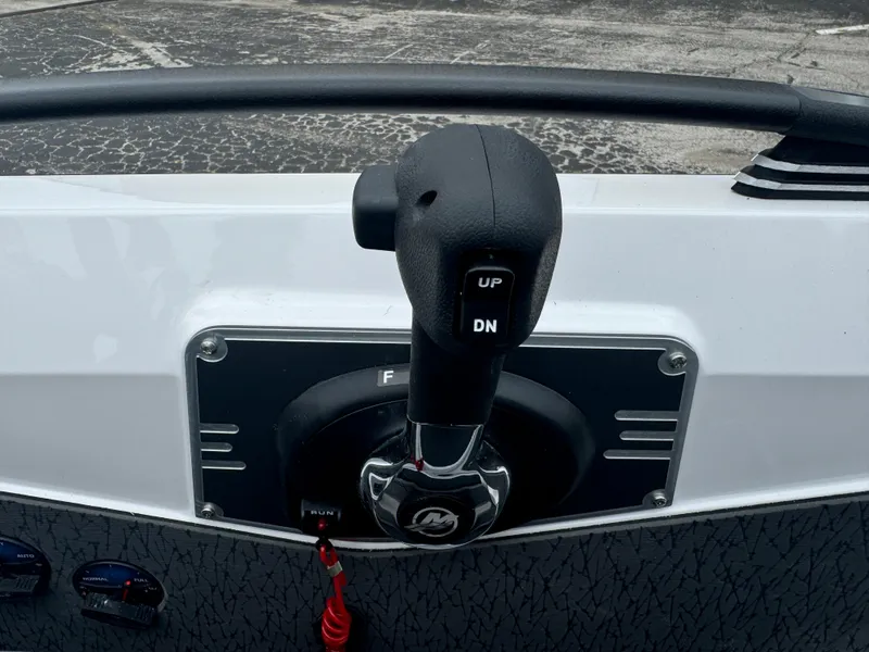 Slide: The Image of Close-up of 2025 Vexus VXS21 boat throttle control lever. - 18