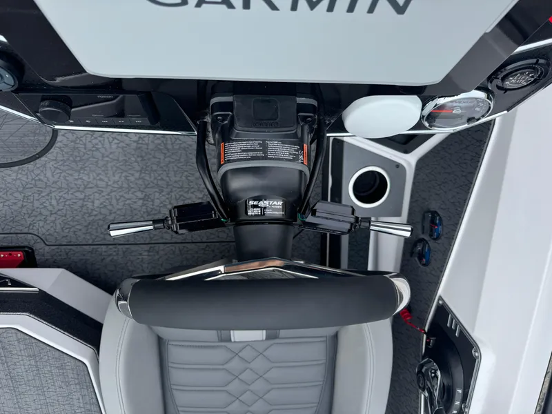 Slide: The Image of 2025 Vexus VXS21 boat cockpit with Garmin electronics and modern controls. - 19