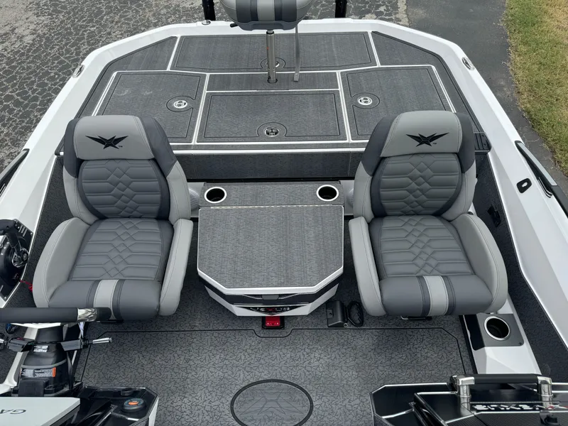 Slide: The Image of 2025 Vexus VXS21 boat interior with dual gray seats and storage compartments. - 22