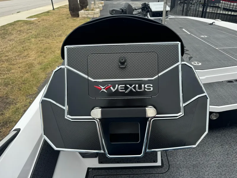Slide: The Image of 2025 Vexus VXS21 boat dashboard with sleek design and logo. - 23