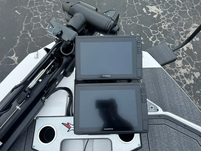 Slide: The Image of 2025 Vexus VXS21 boat with dual Garmin displays and trolling motor. - 35