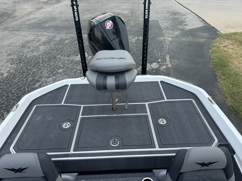 Slide: The Image of 2025 Vexus VXS21 boat deck with seating and motor, featuring sleek design and modern features. - 39