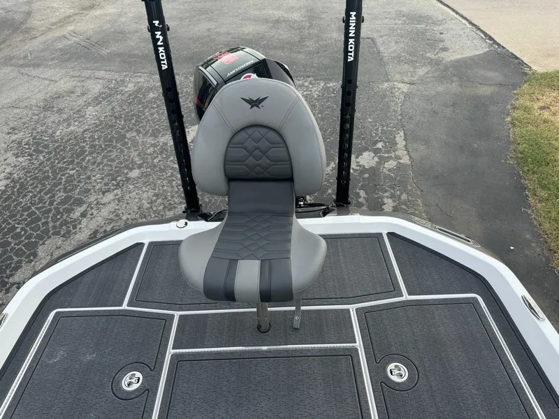 Slide: The Image of 2025 Vexus VXS21 boat with gray seating and Minn Kota accessories. - 45