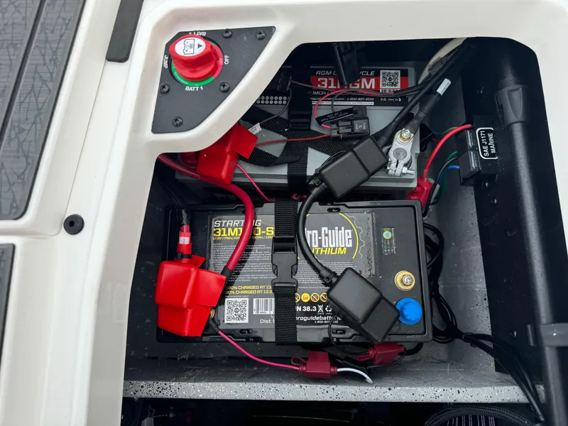 Slide: The Image of Battery compartment of 2025 Vexus VXS21 with Pro-Guide lithium battery and wiring. - 47