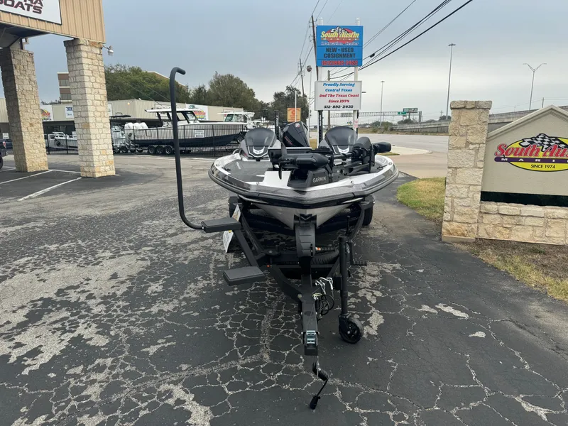 Slide: The Image of 2025 Vexus VXS21 boat on trailer in parking lot. - 7