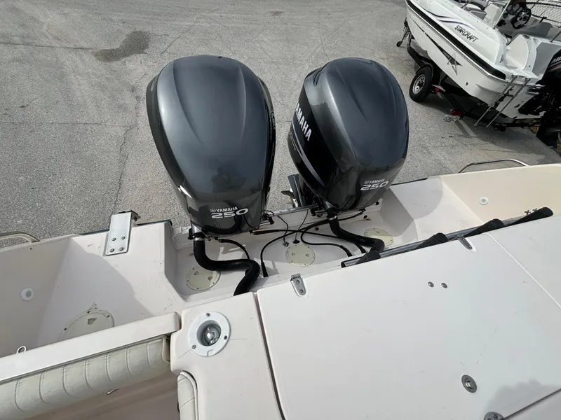 Slide: The Image of 2005 Grady-White Bimini 306 with twin Yamaha outboard engines. - 20