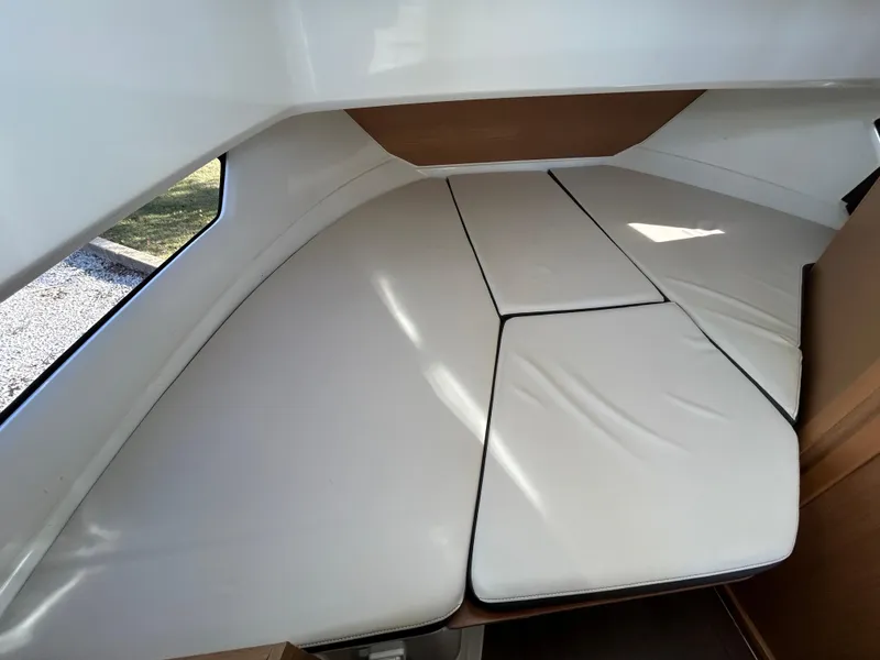 Slide: The Image of 2020 Beneteau Barracuda cabin interior with cushioned seating. - 16