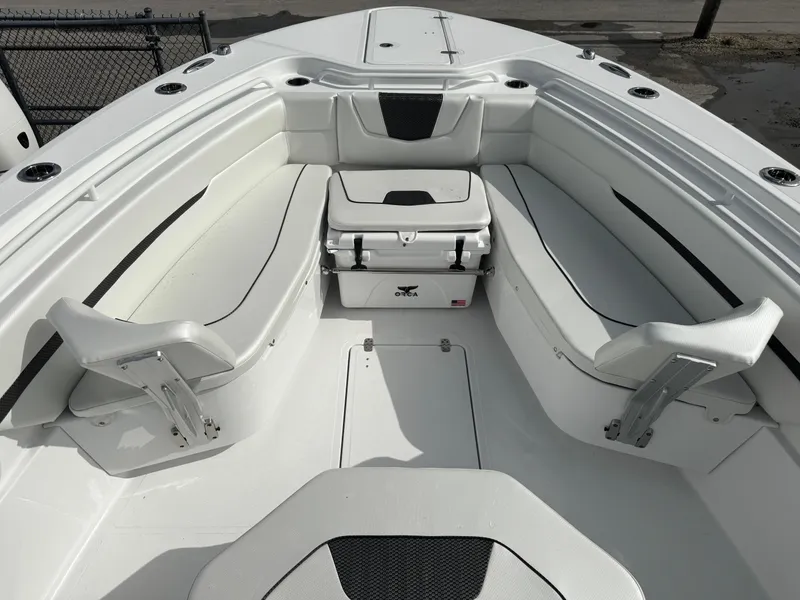 Slide: The Image of 2025 Wellcraft 302 Fisherman boat interior with seating and storage. - 19