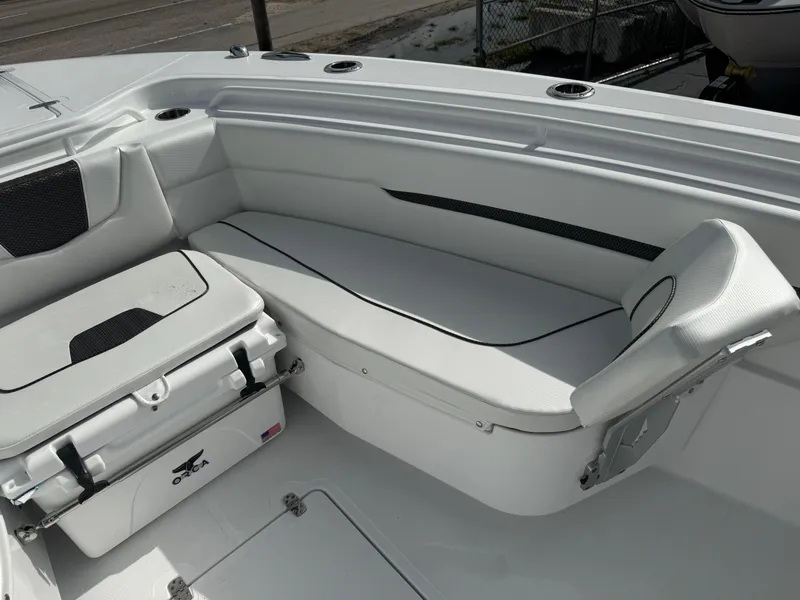 Slide: The Image of 2025 Wellcraft 302 Fisherman boat interior with seating and storage. - 20