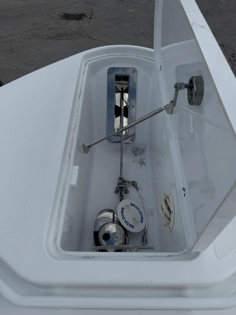 Slide: The Image of 2025 Wellcraft 302 Fisherman anchor locker with windlass system. - 22