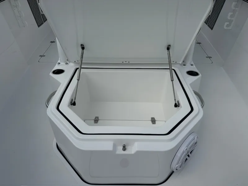 Slide: The Image of 2025 Wellcraft 302 Fisherman boat storage compartment open, showcasing spacious interior. - 26