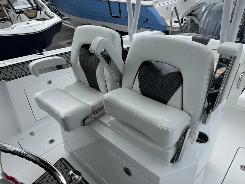 Slide: The Image of 2025 Wellcraft 302 Fisherman boat seats, featuring modern design and comfortable upholstery. - 30