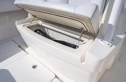 Slide: The Image of 2019 Invincible 36 Open Fisherman boat storage compartment with open lid. - 18