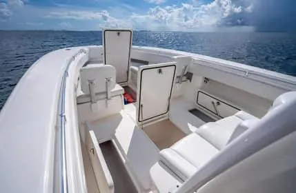 Slide: The Image of 2019 Invincible 36 Open Fisherman boat interior on open water. - 20
