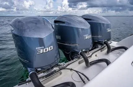 Slide: The Image of Triple Yamaha 300 engines on a 2019 Invincible 36 Open Fisherman boat. - 25