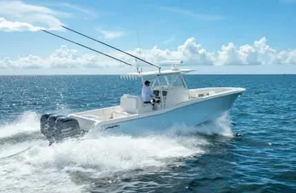 Slide: The Image of 2019 Invincible 36 Open Fisherman boat cruising on open sea. - 27