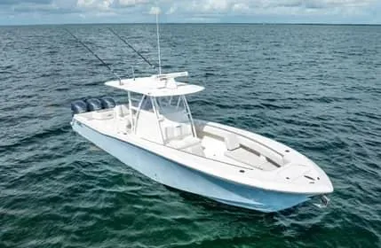 Slide: The Image of 2019 Invincible 36 Open Fisherman boat on open water. - 29