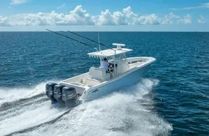 Slide: The Image of 2019 Invincible 36 Open Fisherman speeding on open ocean waters. - 3