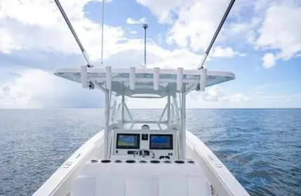 Slide: The Image of 2019 Invincible 36 Open Fisherman boat on open sea under blue sky. - 31