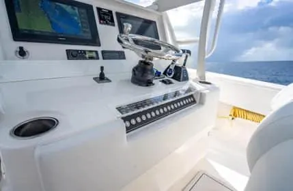 Slide: The Image of 2019 Invincible 36 Open Fisherman boat console with navigation equipment. - 36