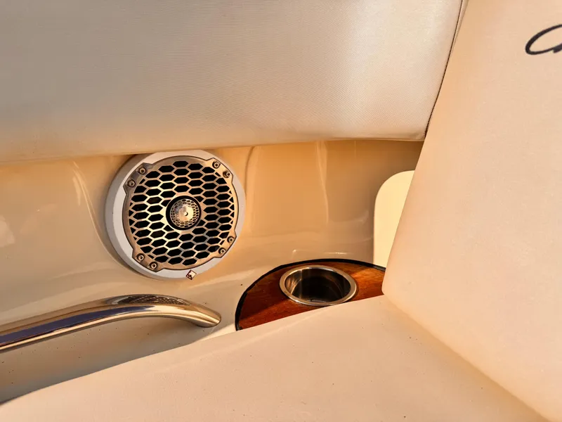 Slide: The Image of 2014 Chris-Craft Launch 25 interior detail with speaker and cup holder. - 12