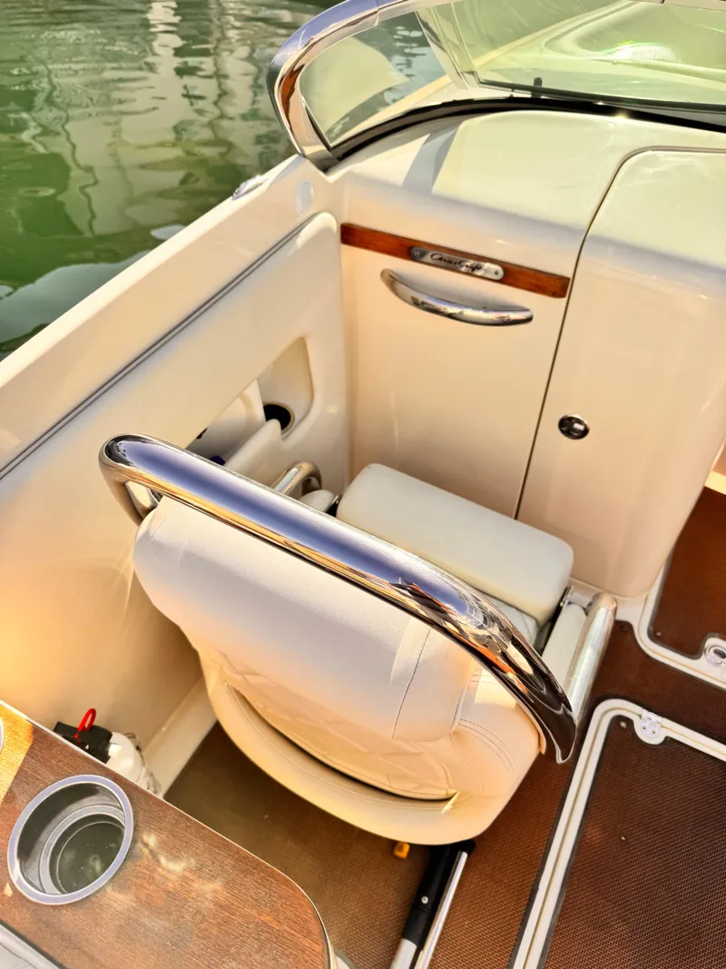 Slide: The Image of 2014 Chris-Craft Launch 25 boat interior with elegant seating and polished details. - 9