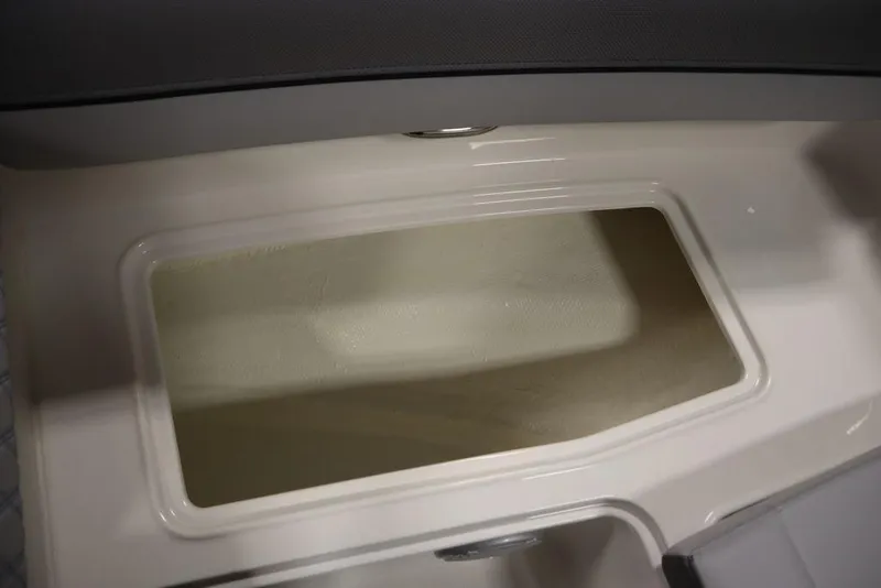 Slide: The Image of 2024 Bayliner 2050 DX storage compartment interior view. - 17