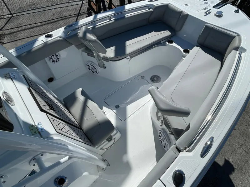Slide: The Image of 2023 Wellcraft 222 Fisherman boat interior with spacious seating and modern design. - 14