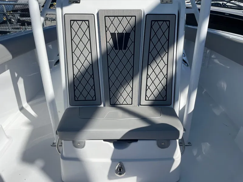 Slide: The Image of 2023 Wellcraft 222 Fisherman boat seat with diamond-patterned upholstery. - 21