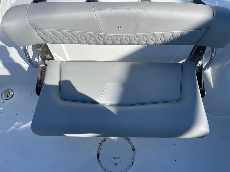 Slide: The Image of 2023 Wellcraft 222 Fisherman boat seat, gray upholstery, modern design. - 8